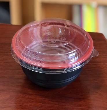 Plastic bowl containing food